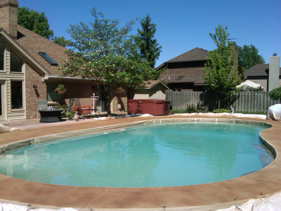 featured image - 8 Key Things to Consider Before Installing a Pool in Your Backyard