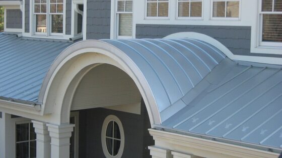 featured image - How Standing Seam Metal Roofing Improved the Value and Appeal of My Property