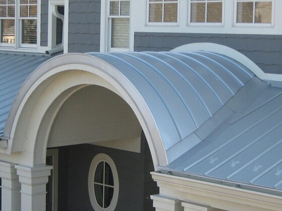 featured image - How Standing Seam Metal Roofing Improved the Value and Appeal of My Property