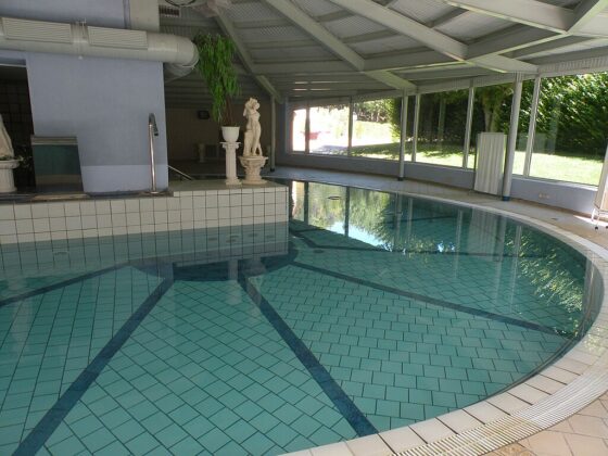 featured image - Indoor Swimming Pools vs Outdoor Swimming Pools Which One is Better for You