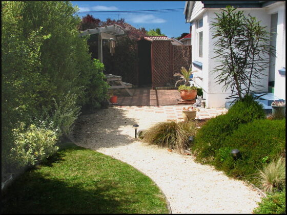 featured image - Designing a Garden for a New Build House Tips and Considerations